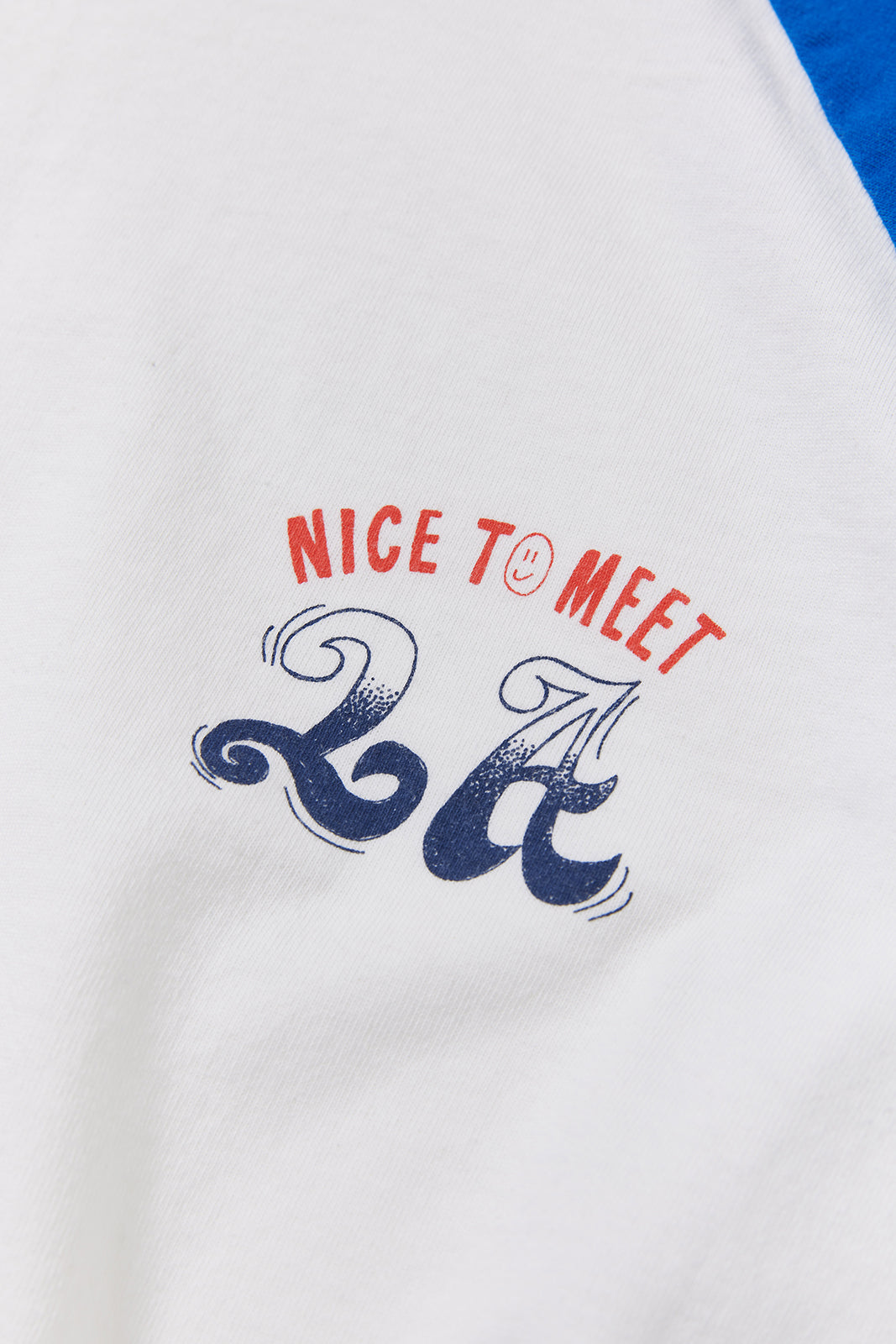 "NICE TO MEET...LA" ラグラン七部袖Tee