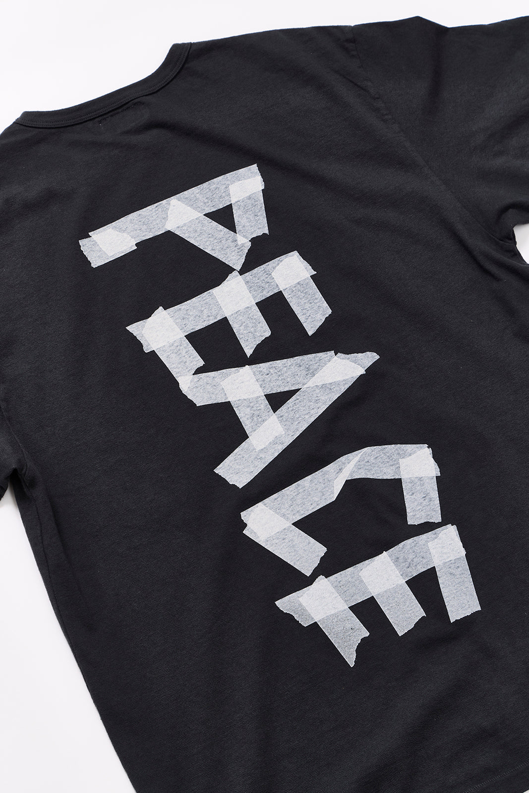 "TAPE PEACE LOGO" リサイクルコットンTee/ALL WE NEED IS PEACE