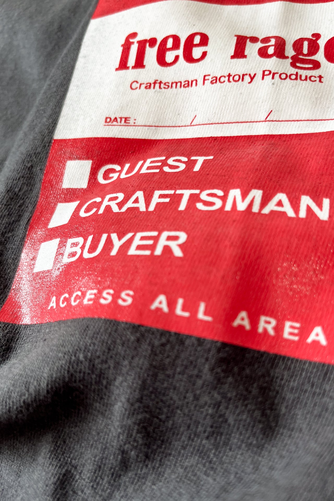 "GUEST PASS" リサイクルコットン長袖Tee
