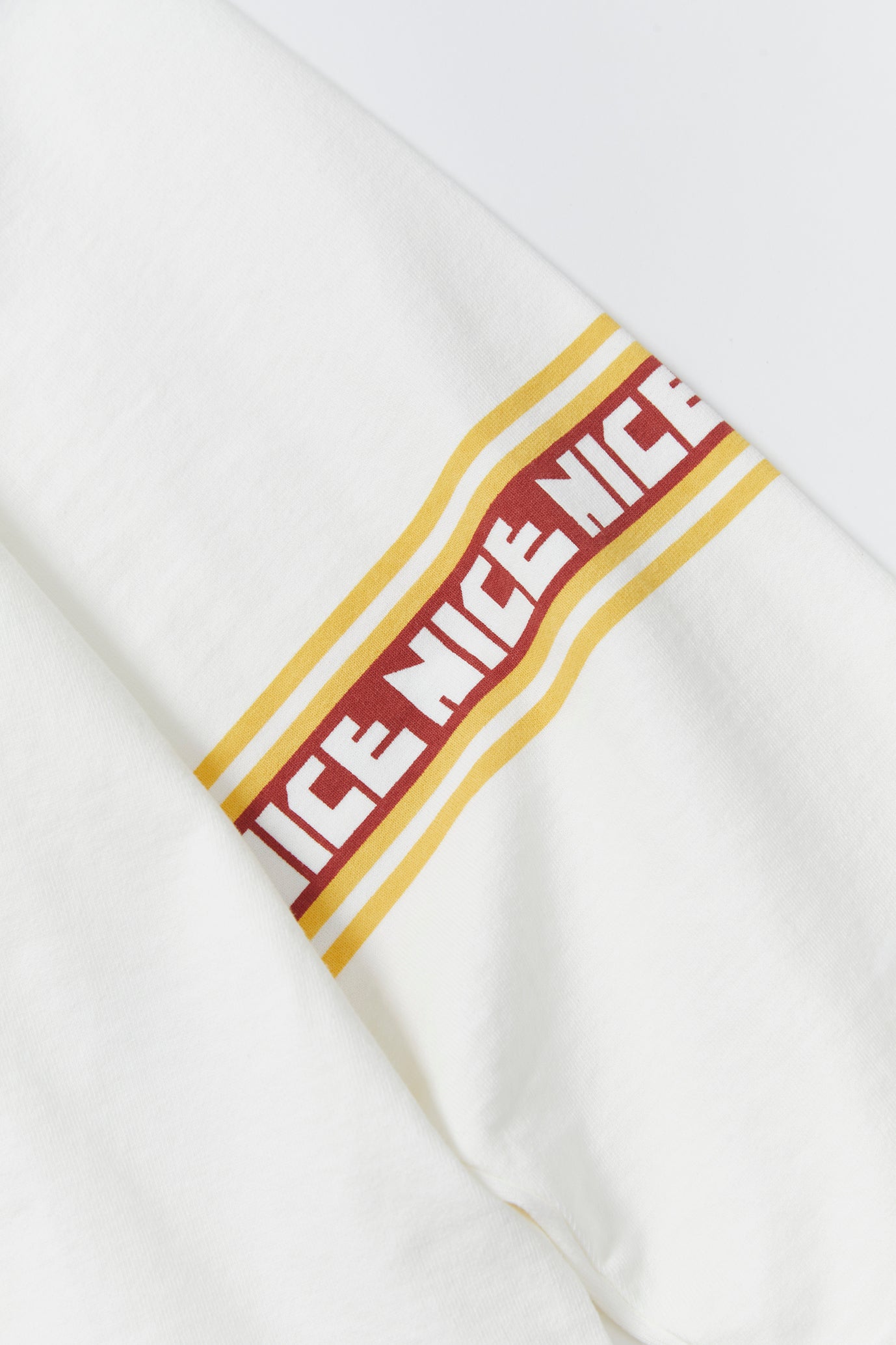 "NICE" フットボール七分袖Tee