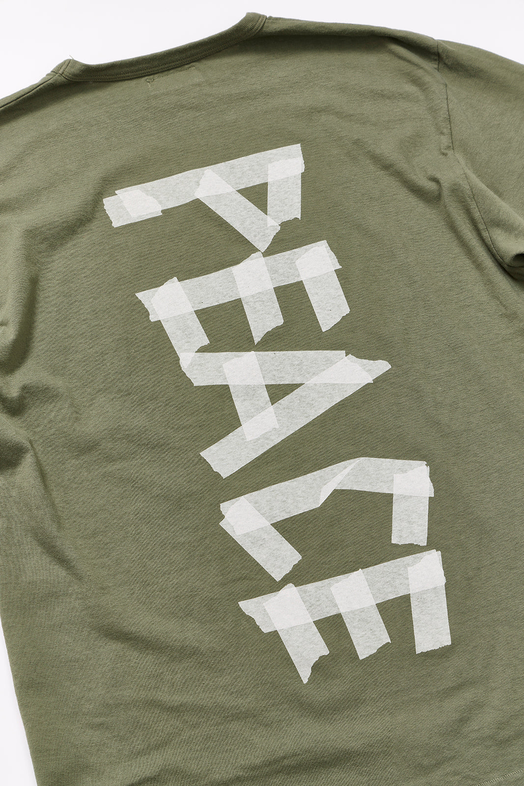 "TAPE PEACE LOGO" リサイクルコットンTee／ALL WE NEED IS PEACE